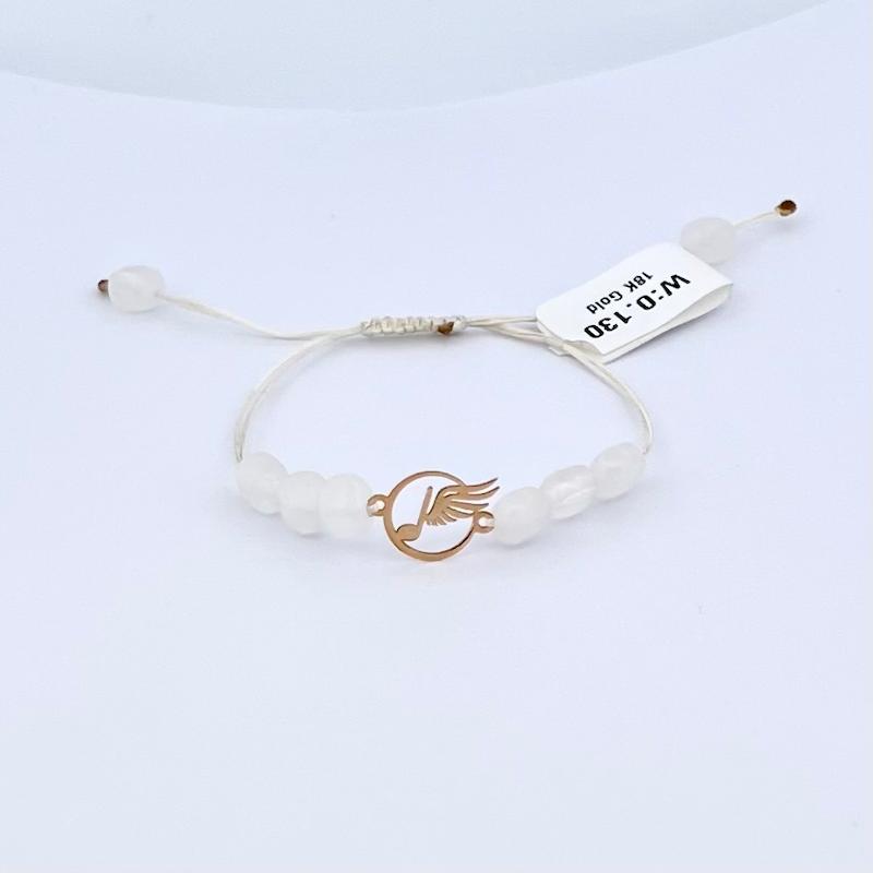 دستبند طلا ۱۸ عیار دستبند نت بالدار مهره سفید گالری زرنوش