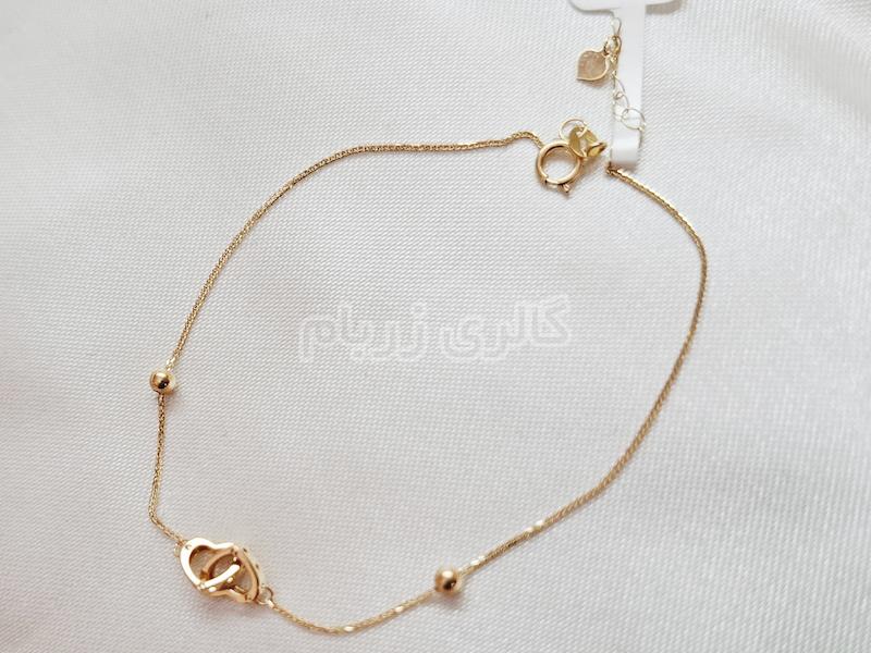 دستبند زنانه طلا ۱۸ عیار دستبند ظریف قلب تو در تو و گوی گالری زربام