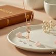 آویز زنانه طلا ۱۸ عیار کلید گالری شمش طلا