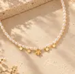 گردنبند زنانه طلا ۱۸ عیار گردنبند چوکر آویز برگ و پولک مرواریدی ایلی گالری