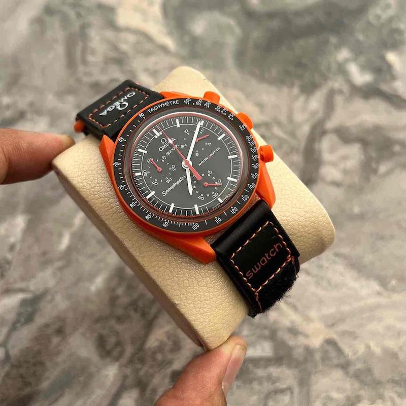 عکس ساعت امگا سواچ نارنجی