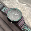 ساعت اسپرت مردانه G-Shock مشکی با بند سبز و بنفش و صفحه مشکی