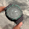 ساعت اسپرت مردانه G-Shock مشکی با بند سبز و بنفش و صفحه مشکی