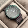 ساعت اسپرت مردانه G-Shock مشکی با بند سبز و بنفش و صفحه مشکی