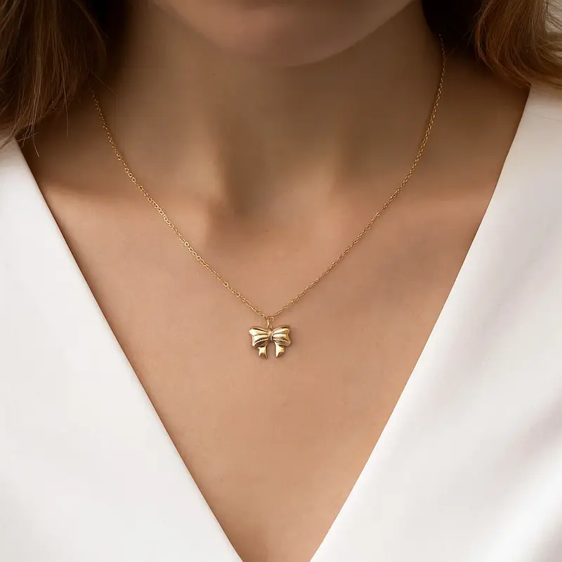 گردنبند طلایی پاپیون استیل