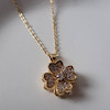 گردنبند طلایی گل چرخان  استیل 