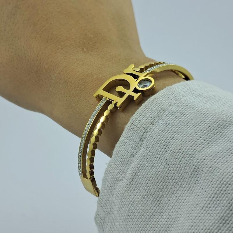 دستبند طلایی دیور استیل