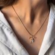 ست گردنبند و گوشواره طلایی پاپیون نگین دار 