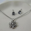 ست گردنبند گوشواره نقره‌ای گل الماسه چرخان استیل کد GA00057