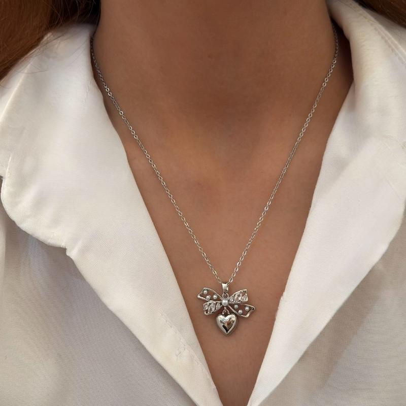 گردنبند نقره‌ای پاپیون و قلب کد GA00083