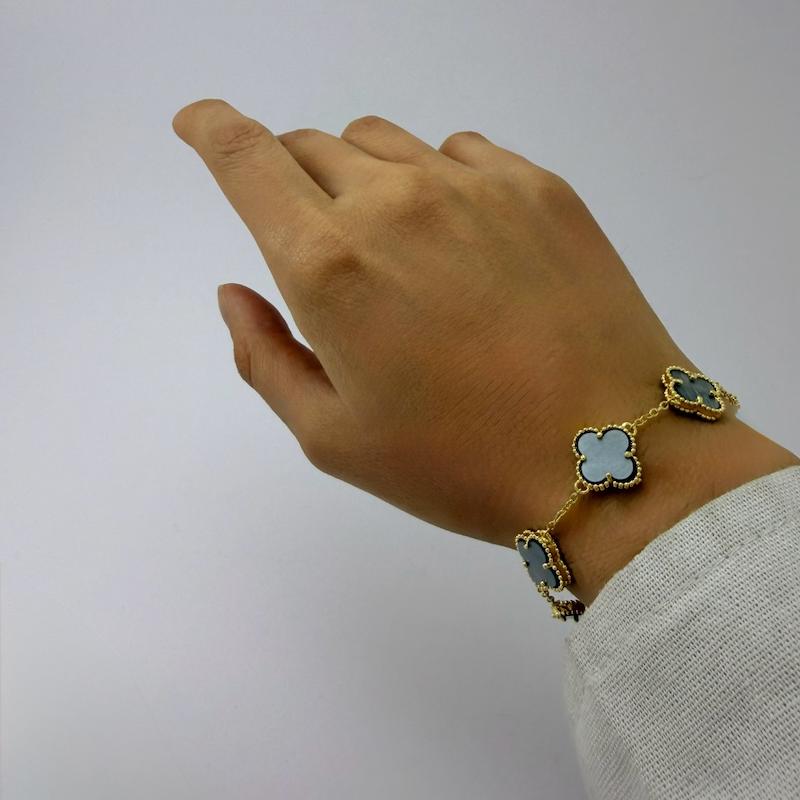 دستبند طلایی مشکی ونکلیف