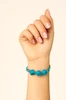 دستبند فیروزه‌ای چهار سنگ – ترکیبی از زیبایی و انرژی مثبت