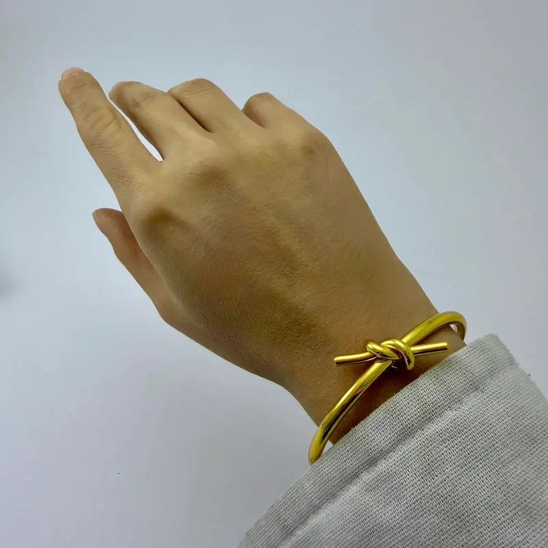 بنگل طلایی استیل طرح گره BA00138