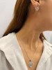 نیم ست گردنبند و گوشواره نقره ای استیل پر طاووس کد GA00087