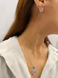 نیم ست گردنبند و گوشواره نقره ای استیل پر طاووس کد GA00087
