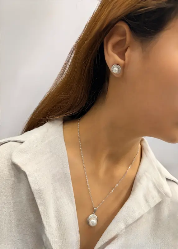 نیم ست گردنبند و گوشواره نقره ای مرواریدی استیل 