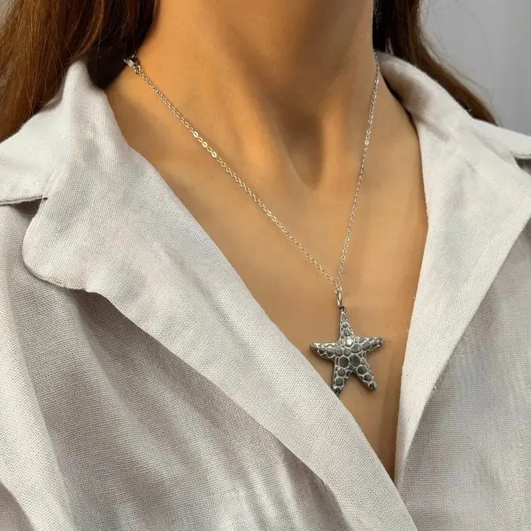 گردنبند نقره‌ای استیل ستاره دریایی کد GA00093