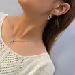 نیم ست گردنبندگوشواره نقره‌ای ژوپینگ الماسه کد GA00152