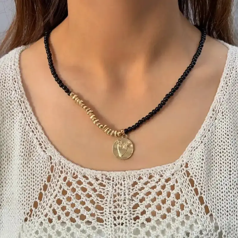 گردنبند طلایی مرواریدی مشکی