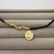 گردنبند طلایی مرواریدی مشکی