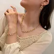 ست طلایی گردنبند دستبند گوشواره تیفانی کد GA00189