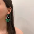 گوشواره نگینی طرح گل سبز سلطنتی کد GO00307