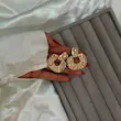 گوشواره طلایی فشن با طراحی دفرمه زنانه