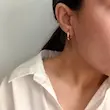 گوشواره طلایی ژوپینگ طرح گرد روی گوش مدل