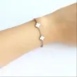 دستبند نقره ای ونکلیف استیل با گل سفید