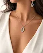 نیم ست گردنبندگوشواره نقره‌ای ژوپینگ الماسه روی مدل