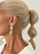 گوشواره نقره‌ای دفرمه استیل میخ نقره دوکاره فشن