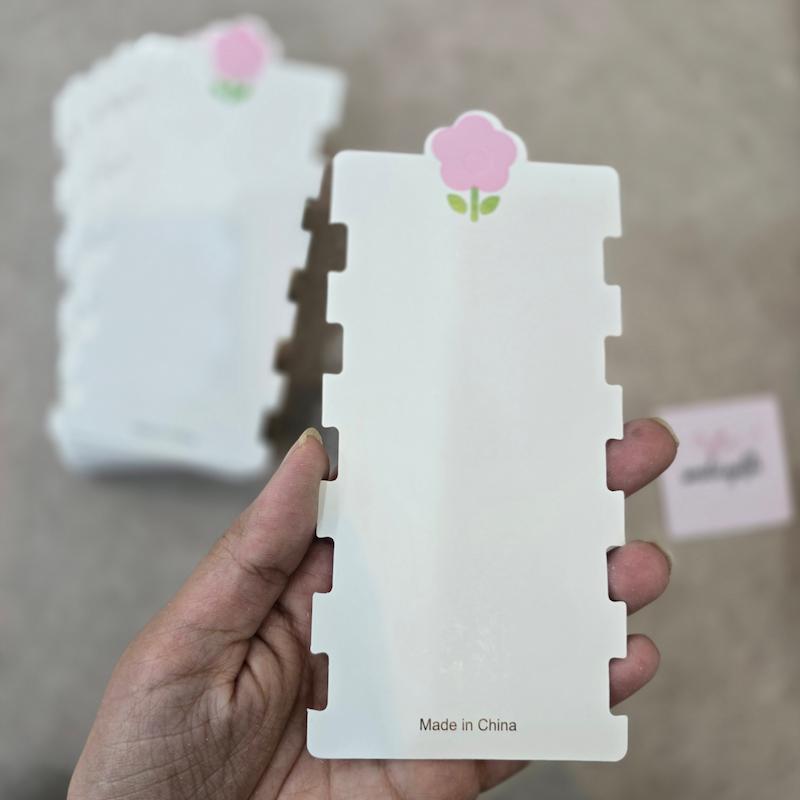 تگ کش مو دندونه دار طرح گل