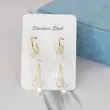 گوشواره آویزی زنانه مدل گلی کد AAC1136