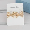 گوشواره میخی زنانه مدل پاپیون کد AAC1131