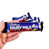 شکلات میوه و مغز کدبری مدل دیری میلک 49 گرم- Cadbury dairy milk