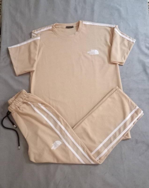 ست تیشرت شلوار بیسکوییتی طرح THE NORTH FACE 