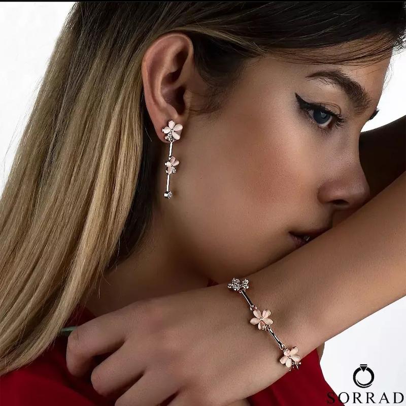 ست دستبند و گوشواره طرح گل اپال کلیو