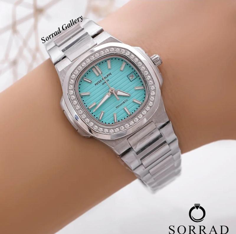 ساعت پتک فیلیپ زنانه / ساده بند استیل رنگ سیلور صفحه دورنگین آبی تیفانی