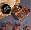 عطر زنانه آمبر الکسیر قهوه ای 