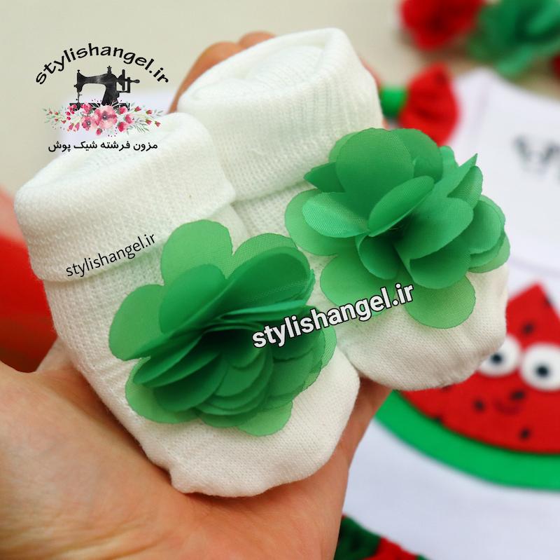 جوراب یلدایی دخترانه با گل قرمز و سبز دارای سایزبندی