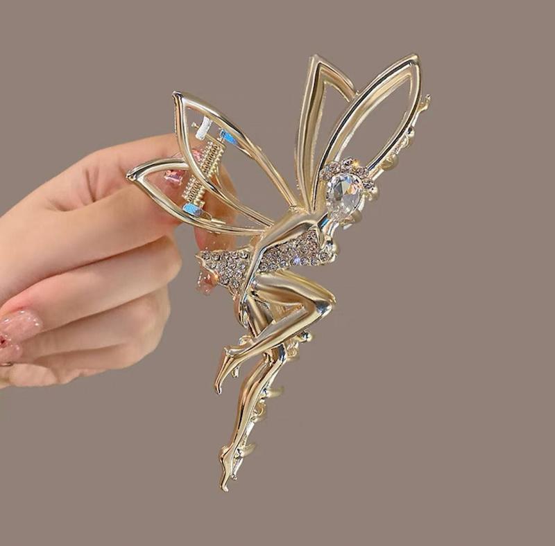 کلیپس فلزی مجلسی بسیار شیک طرح فرشته (آنجل) به رنگ طلایی با نگین های درخشان - گلسر سوما