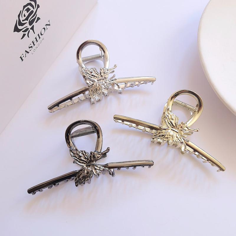 سه عدد کلیپس فلزی طرح پروانه در رنگهای طلایی، نقره ای و دودی - گلسر سوما