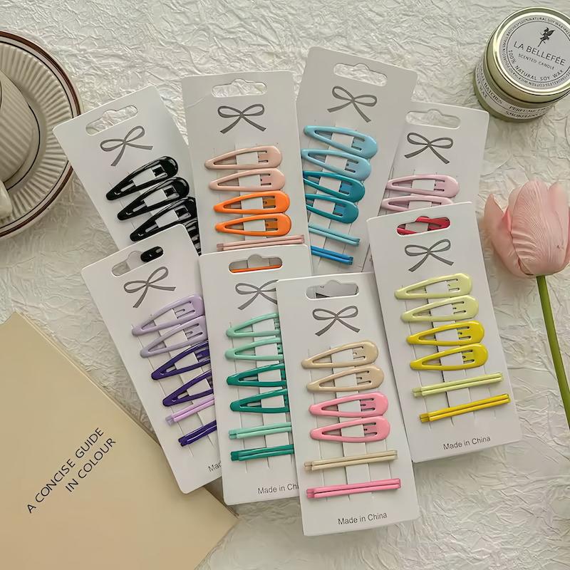 پک های ترکیبی گیره تق تقی بادومی و سنجاق مو لاکی در رنگ های براق صورتی، زرد، کرم، آبی و بنفش - گلسر سوما