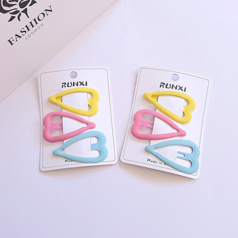 پک سه عددی گیره تق تقی طرح قلب در رنگ های صورتی، زرد و آبی - گلسر سوما