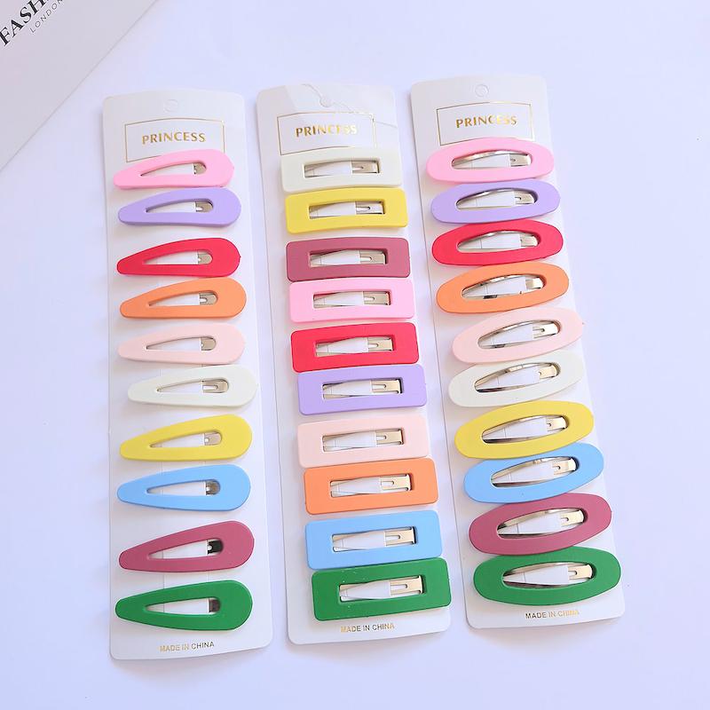 پک ده عددی گیره تق تقی شمعی رنگی در طرح های مستطیل و اشکی - گلسر سوما