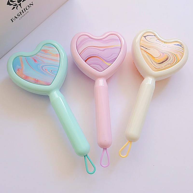 برس مو فانتزی به شکل قلب با طرح ماربل در چهار رنگ پاستیلی - سایت فروشگاهی گلسر سوما