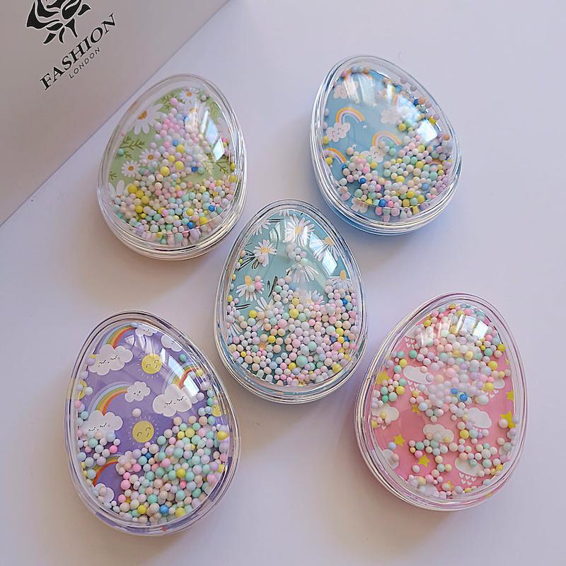 برس مو آکواریومی فانتزی با طرح های رنگین کمان و گل دانه های رنگی متحرک - گلسر سوما