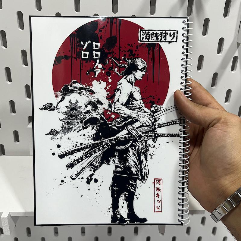 دفتر انیمه وان پیس طرح زورو و ماه قرمز خط دار 80 برگ (رورونوا زورو)one piece دفتر مشق رورونوا زورو