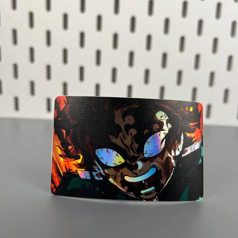 استیکر کارت انیمه شیطانکش طرح تانجیرو کامادو ، استیکر عابربانک هولوگرامی انیمه ای،