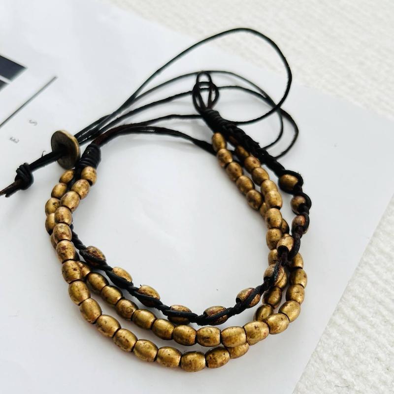 دستبند گره ای برنجی ترکیب با چرم 